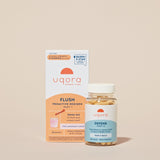 A box of packets that says 'Uqora Pink Lemonade' Flush, and a bottle with pills that says 'Uqora Defend'
