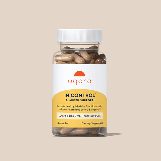 Supplement bottle labeled 'In Control Bladder Support' by uqora on a beige background